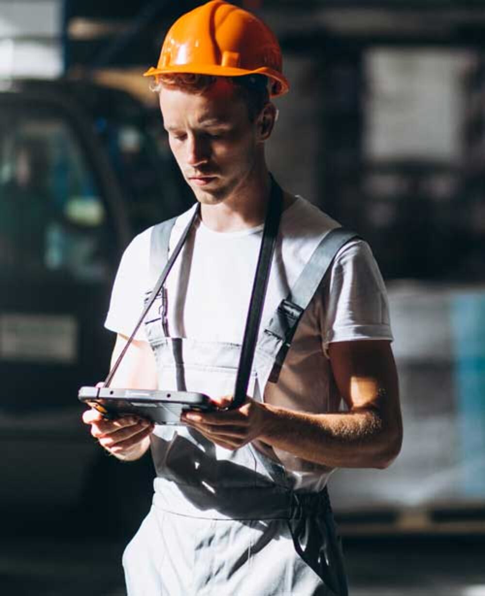 A St. Clair Packaging team member checking a job on the plant floor
